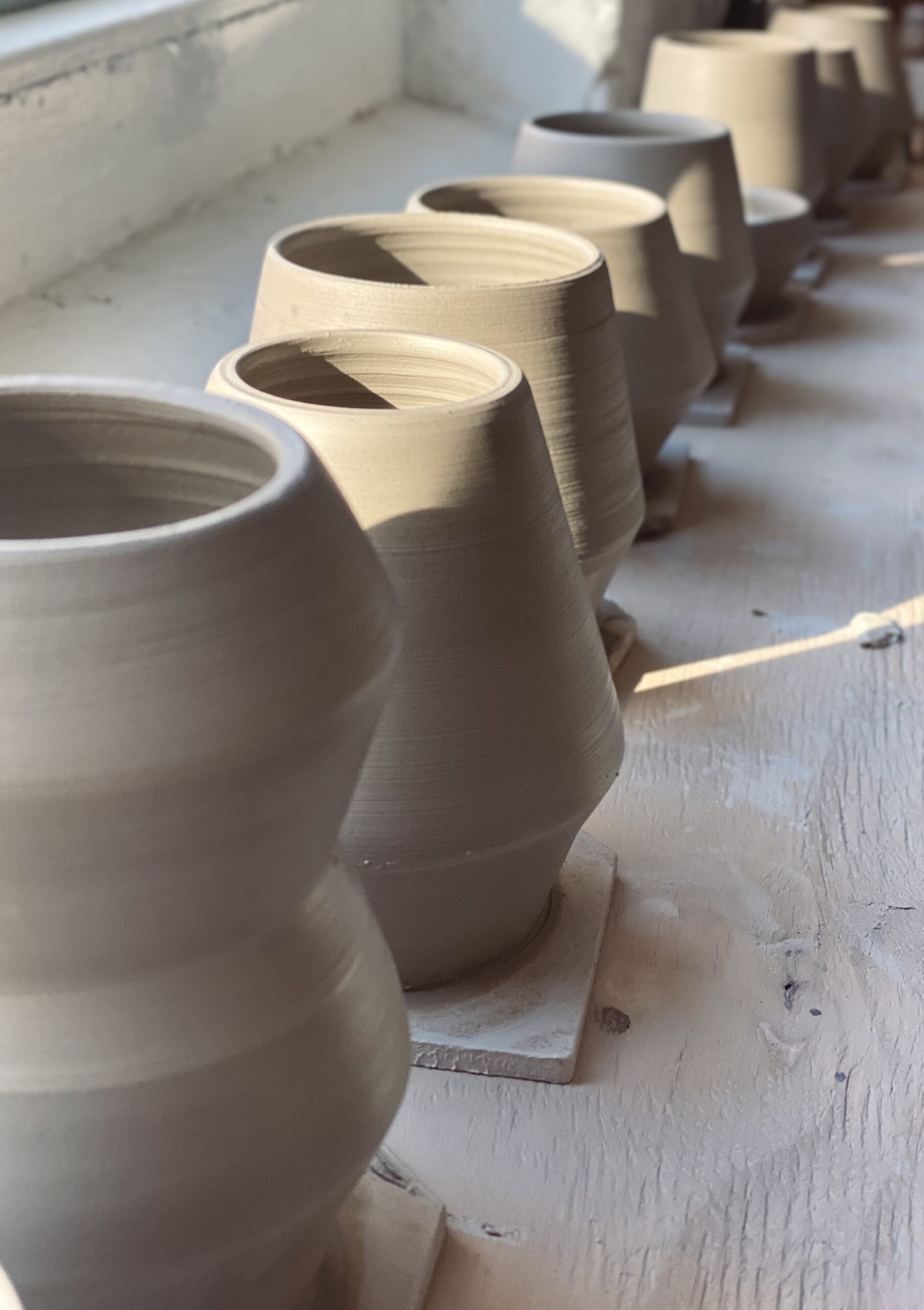 a row of clay pots